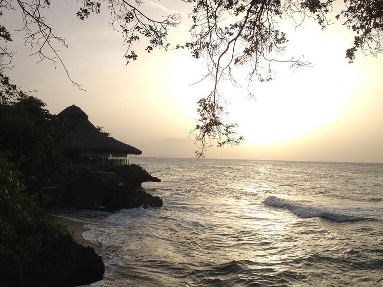 Bay in the dominican republic with a view on the sea and a bungalow